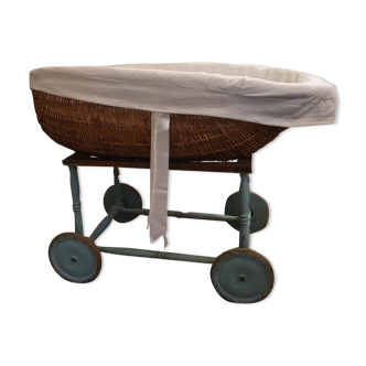 VINTAGE RATTAN BABY CRIB ON WHEELS