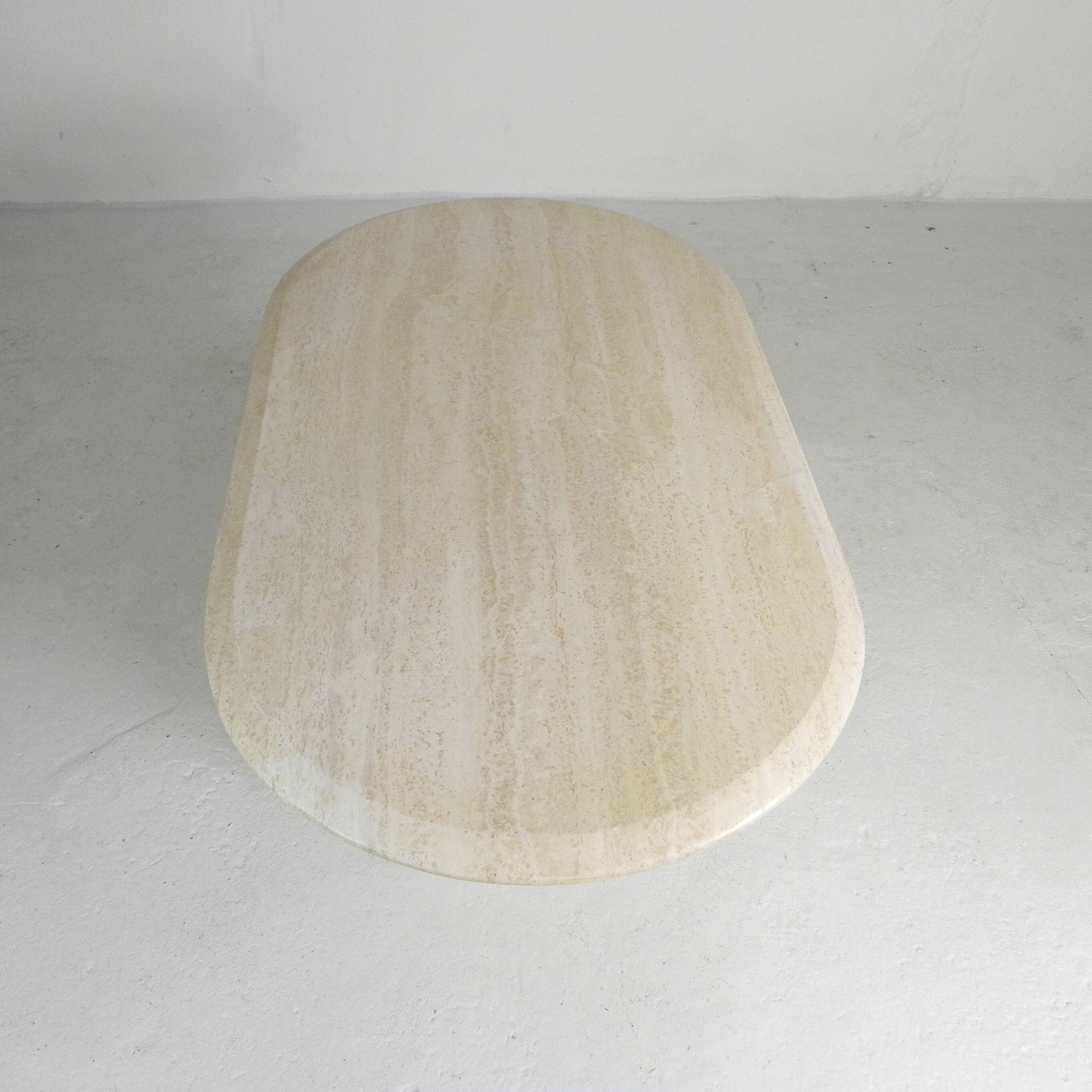 Mid-Century travertine coffee table with an oval top, 1970s.