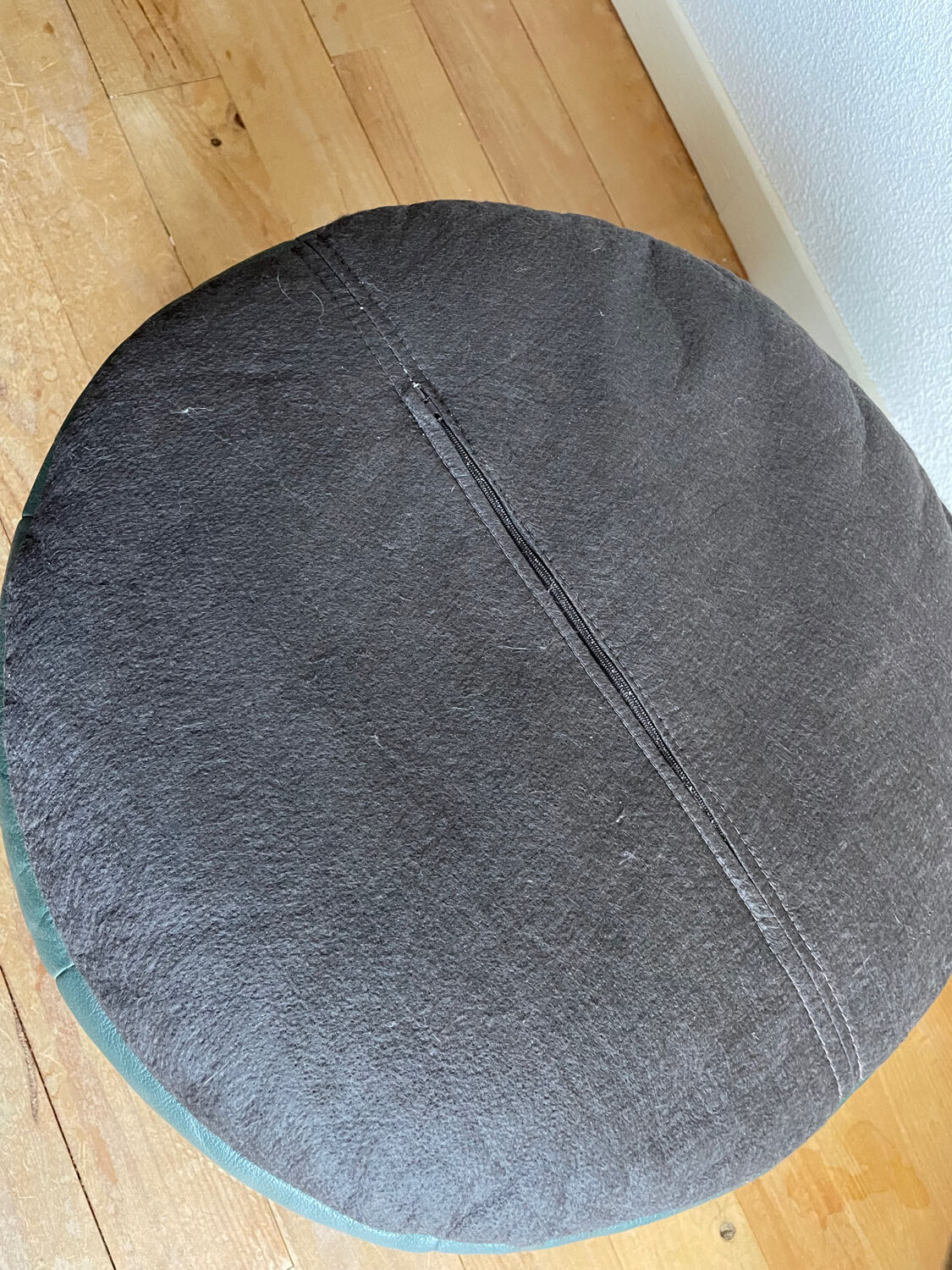 Green patchwork leather pouf from Sède