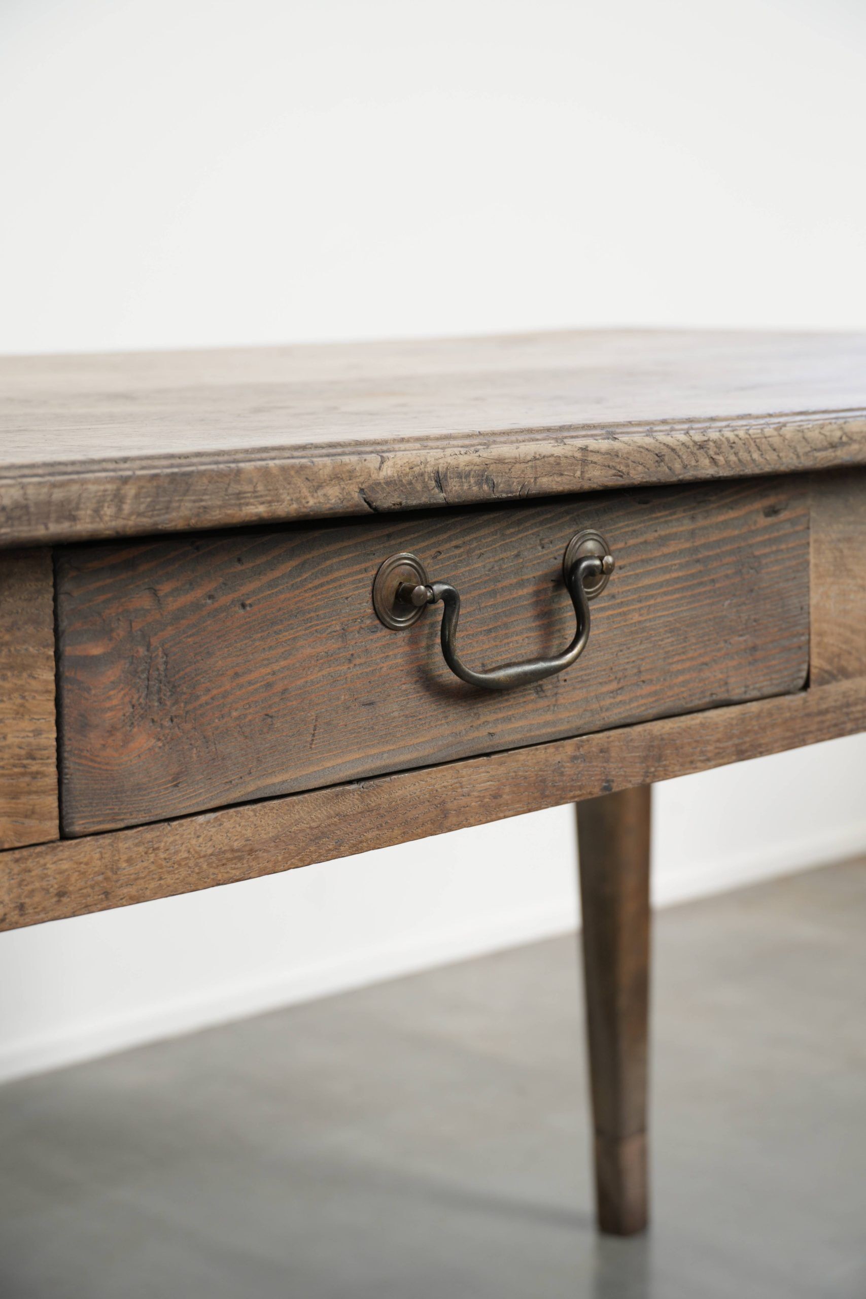 Antique French oak dining table for 6 to 8 people with a baguette drawer