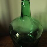 Dame Jeanne carboy from the Viresa collection in dark green glass