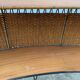 Vintage 1950s bar counter with its two rattan and metal stools.