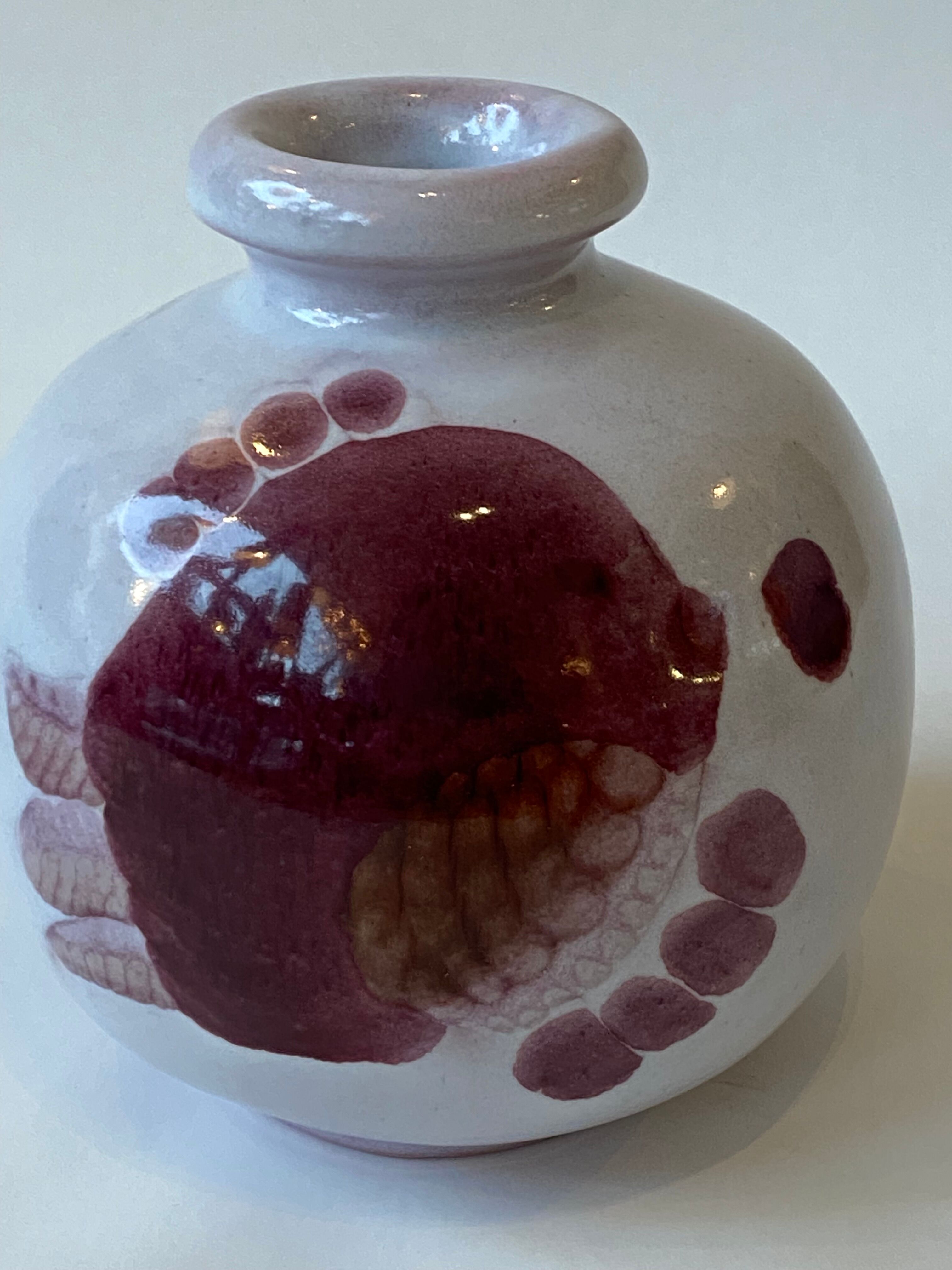 Ceramic vase by Jean and Robert Cloutier with fish decoration