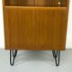 Narrow teak bookcase with two doors by Omann Jun, 1970s