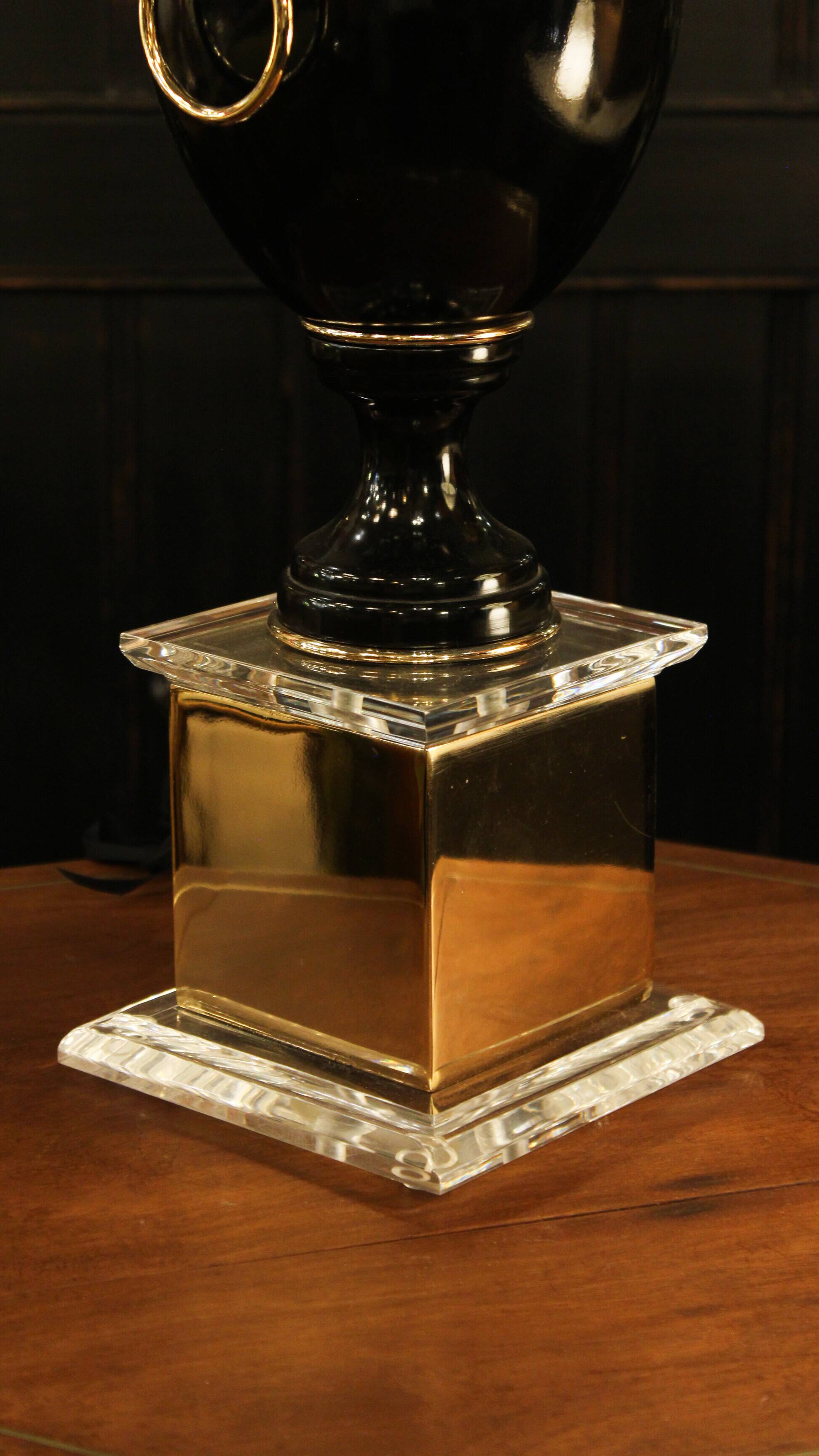 Black lamp in Hollywood Regency style