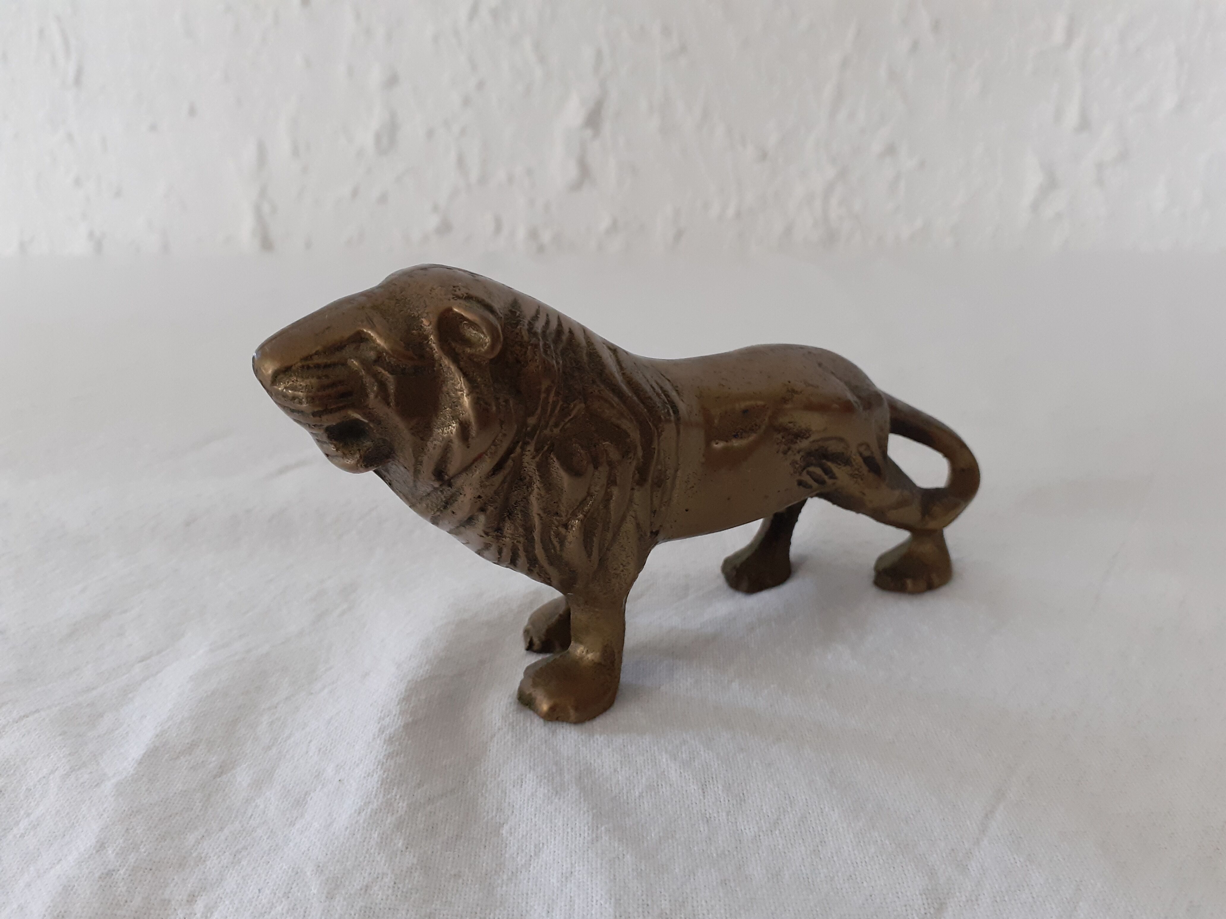 Animal lion in brass or bronze