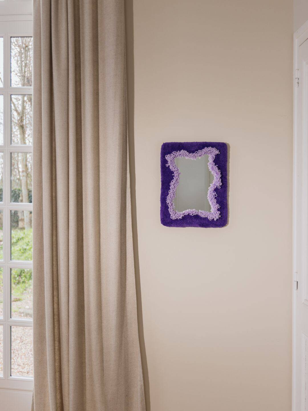 Small purple organic mirror