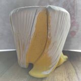 Cache-pot seventies en forme de banane