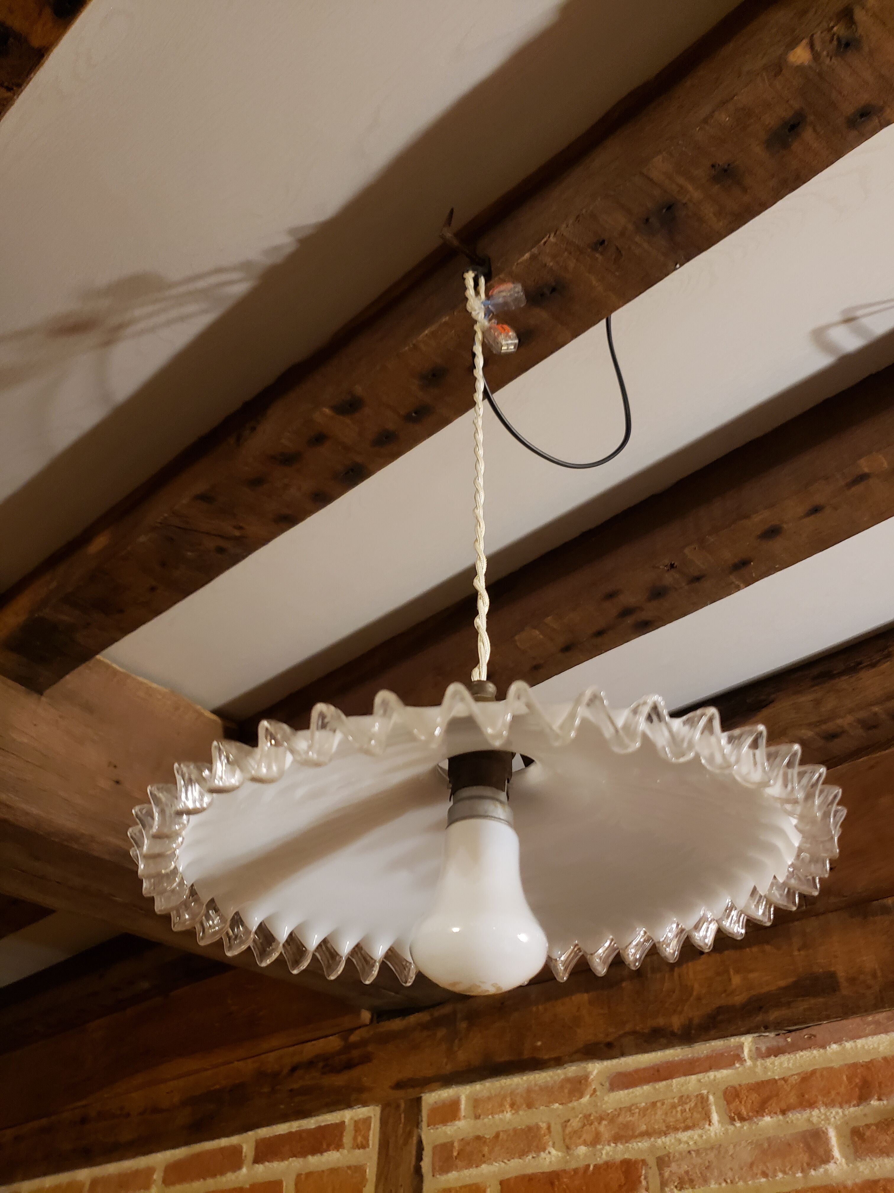 White opaline pendant lamp with serrated edges