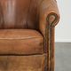 Vintage sheepskin clubchair in a beautiful cognac colour with a sturdy look