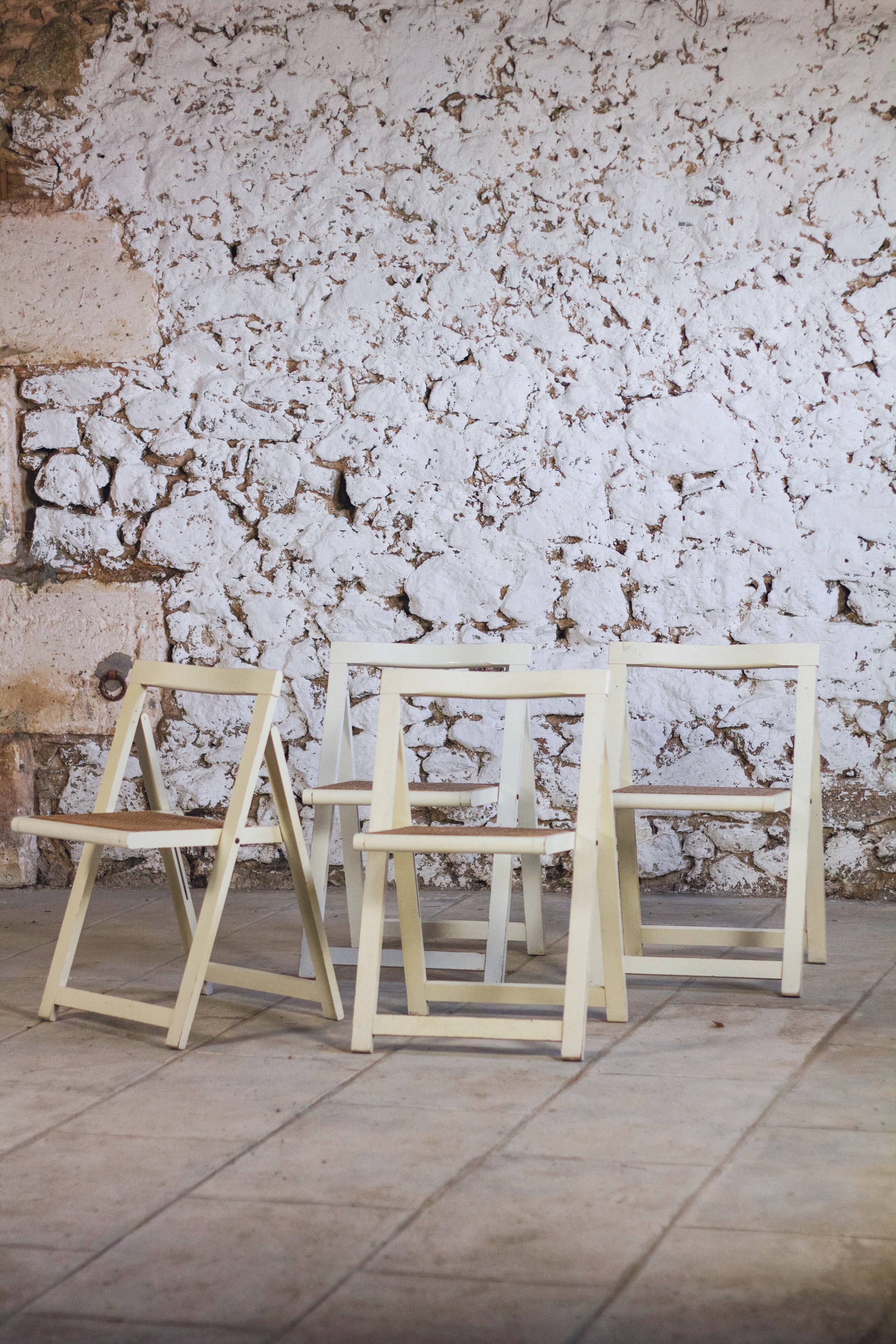 4 vintage folding cane chairs