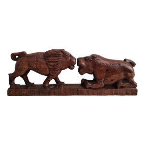 Lion and hippopotamus wood sculpture