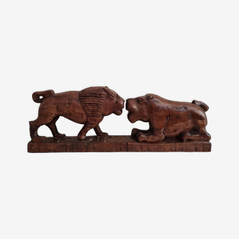 Lion and hippopotamus wood sculpture