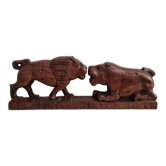 Lion and hippopotamus wood sculpture