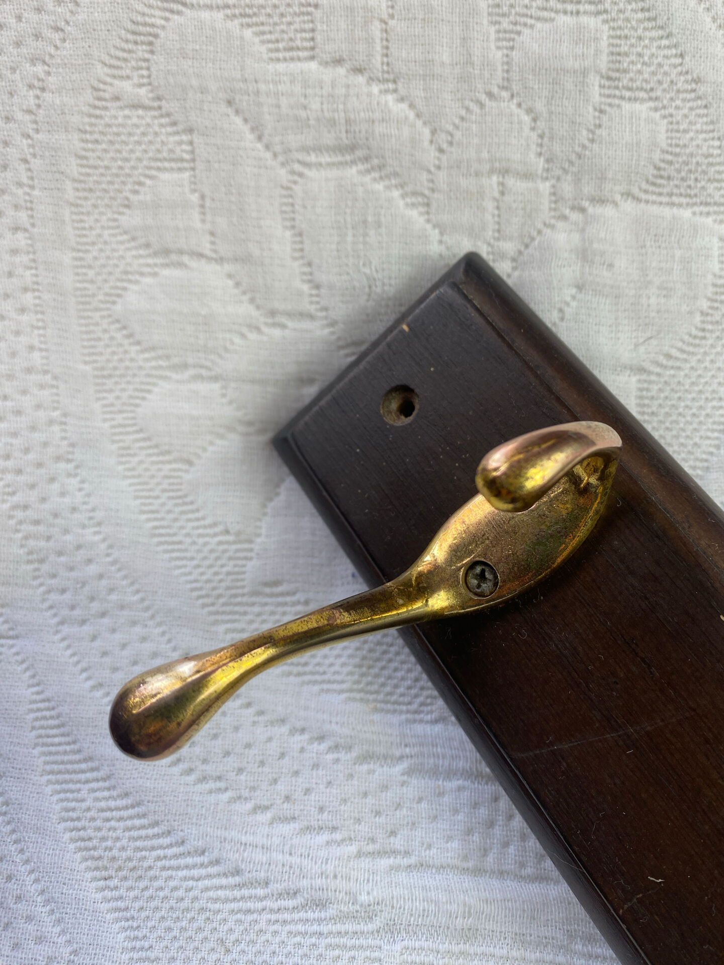 Wooden coat rack with double brass hooks