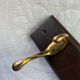 Wooden coat rack with double brass hooks