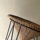 Italian sunflowers armchair in rattan and black metal, 1950s design.