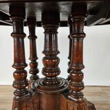 Coffee table in walnut with maple inlays and wheels