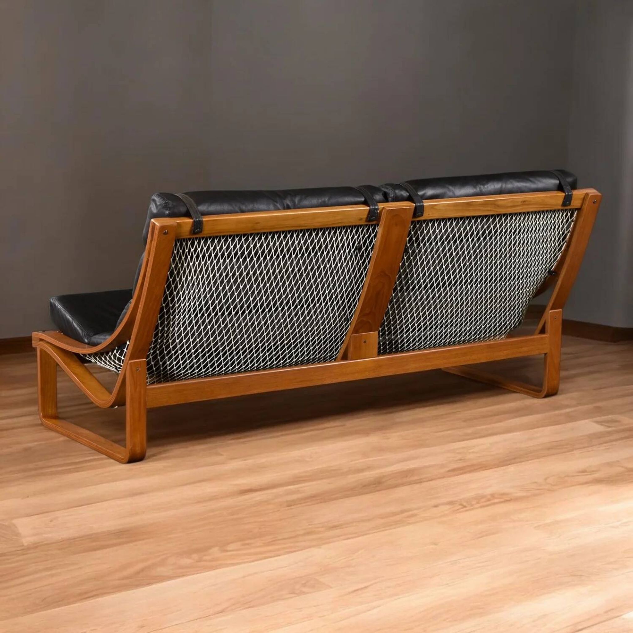 T4 black leather and teak sofa by Fred Lowen for Tessa, 1970s