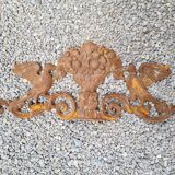 Cast iron pediment with birds