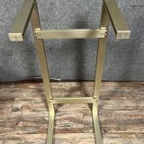 Design coffee table in gilded metal and tinted glass