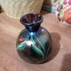 Iridescent marbled vase in the style of Loetz.