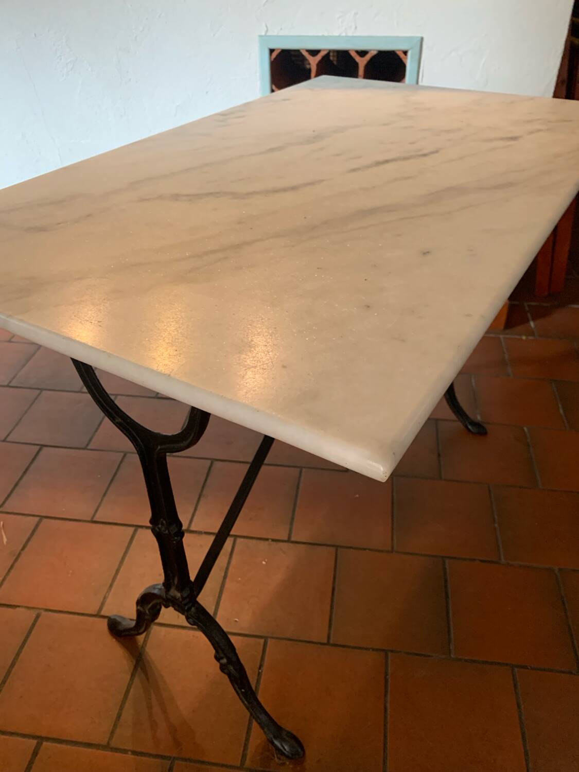 Marble and wrought iron bistro table