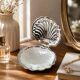 Shell-shaped butter dish in stainless steel