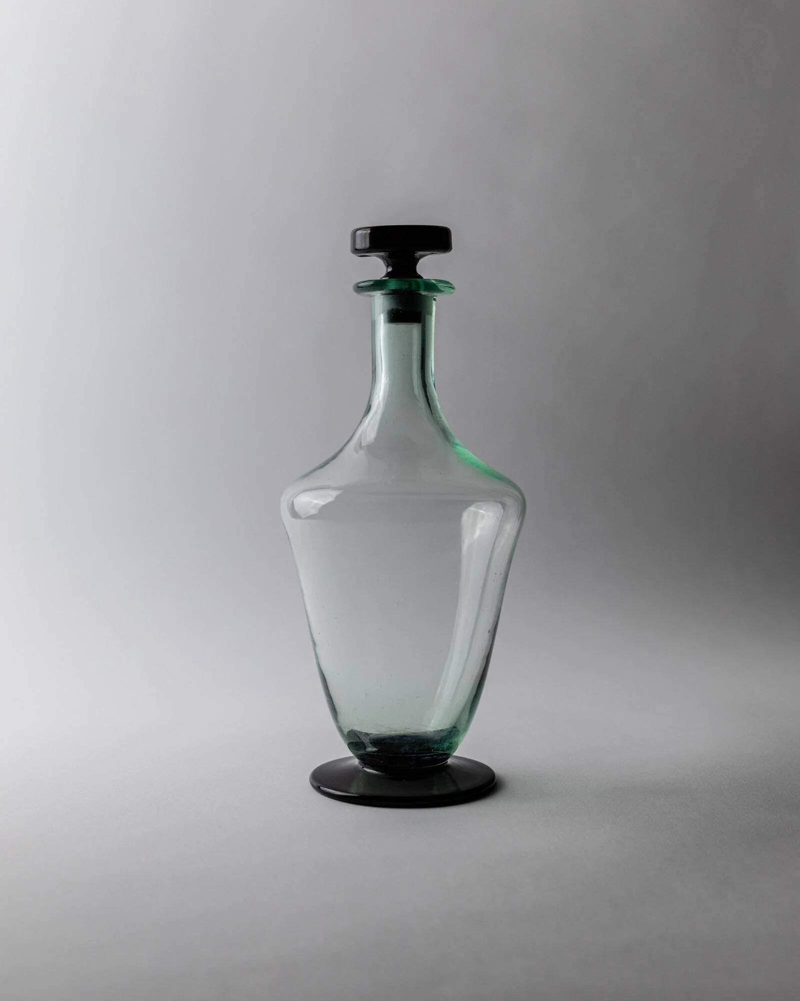 Vintage Murano glass carafe from the 1960s, green and black, with a stopper.