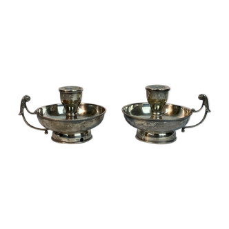 Pair of hand candlesticks with 19th century handles in solid silver