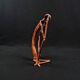 Dogon Nommo bronze statue with brown patina and red highlights, mid-20th century