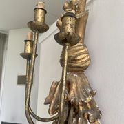 Carved wall lamp in wood of the seventeenth century