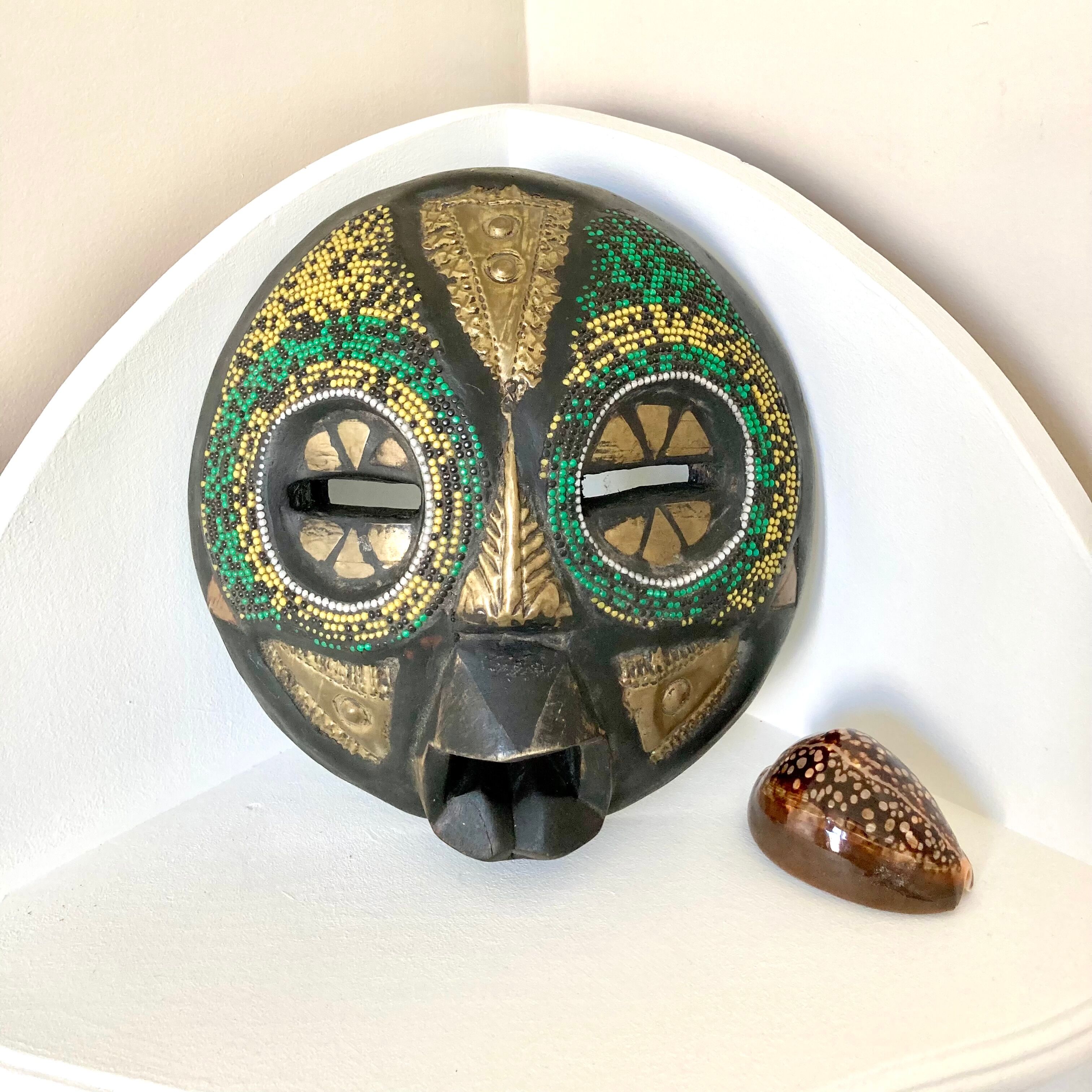 Vintage mask in carved wood beads and copper metal