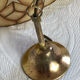 Large mother-of-pearl and brass chandelier with floral decoration.