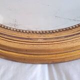 Miroir ancien en bois doré