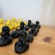 Box of 12 dog-shaped cutlery rests in yellow and black majolica.