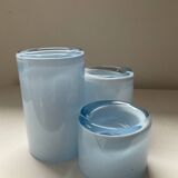 Trio of vintage candlesticks in double-layer glass paste