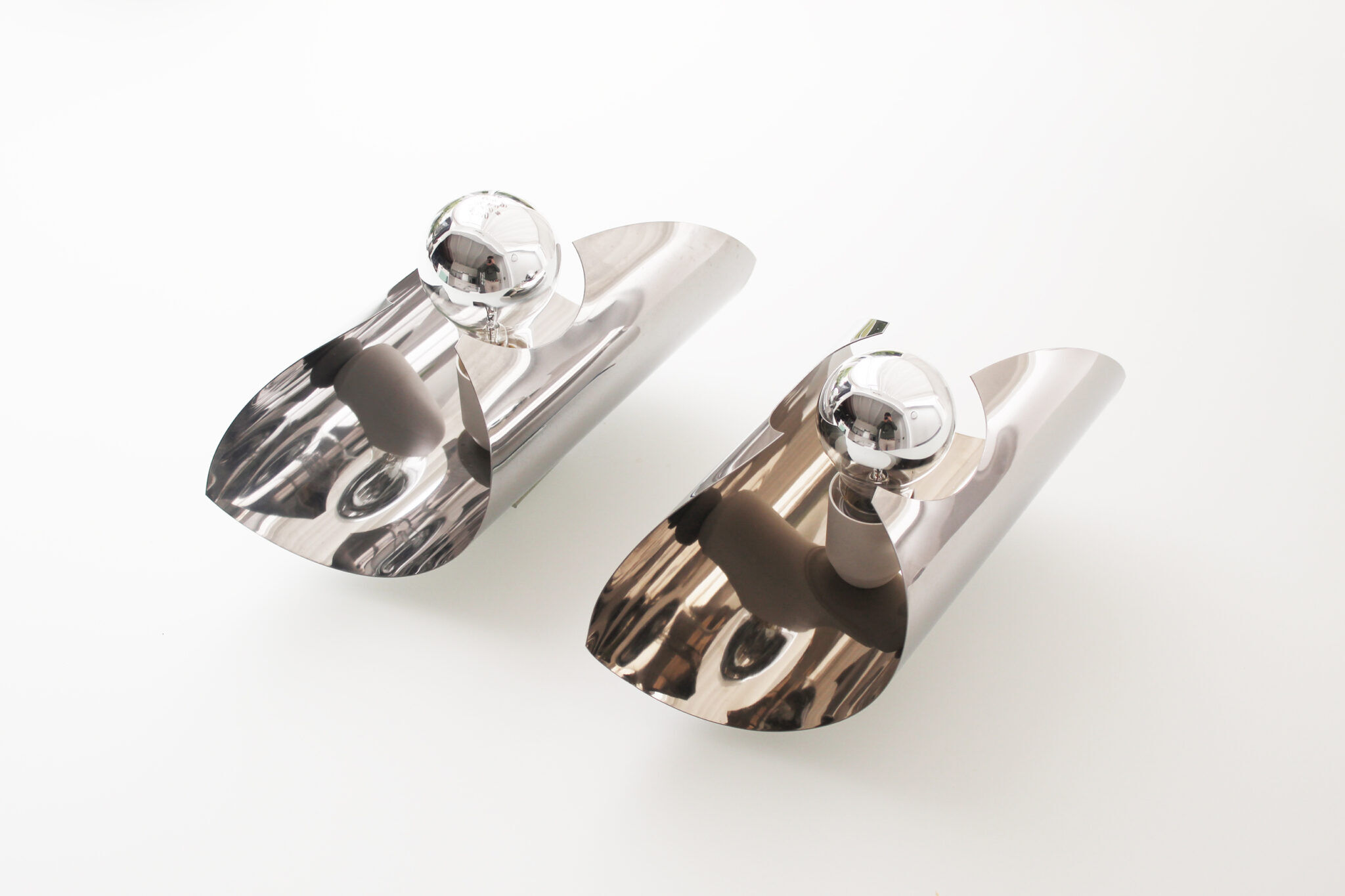 Vintage pair of 1970's chrome space age wall lights