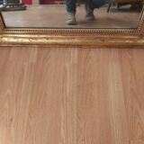Golden Louis Philippe mirror with golden leafy