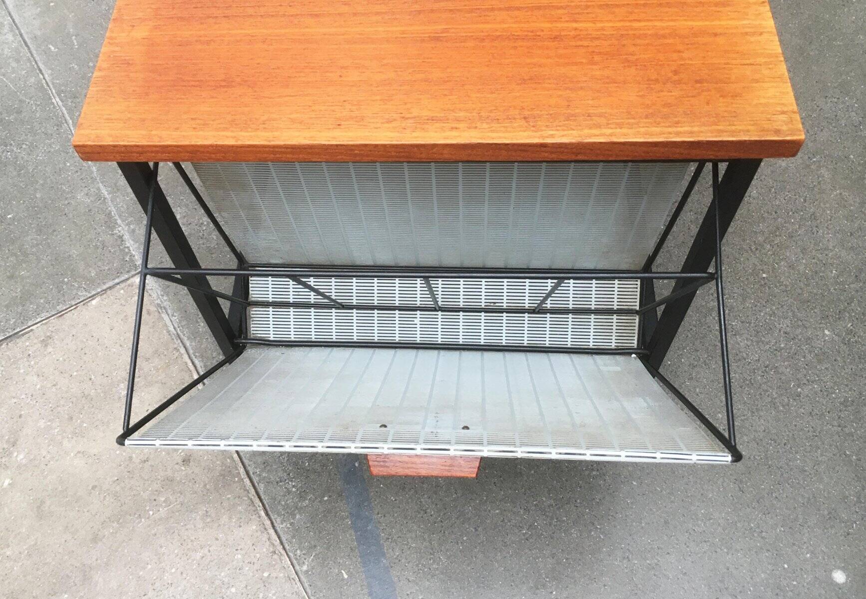 Mid-century teak side table with magazine rack.