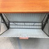 Mid-century teak side table with magazine rack.