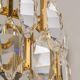Pair of wall sconces in gilded brass and crystal by Palwa, Germany, 1970s.