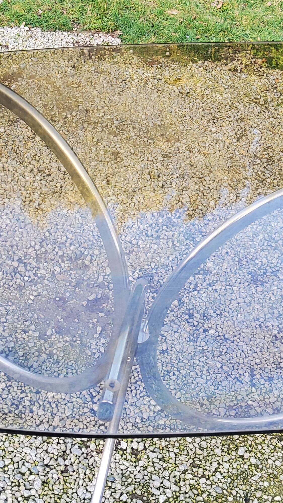 Designer table from the 70s, smoked glass top, chrome base