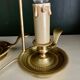 Pair of bronze hot water bottles and Empire-style painted sheet metal