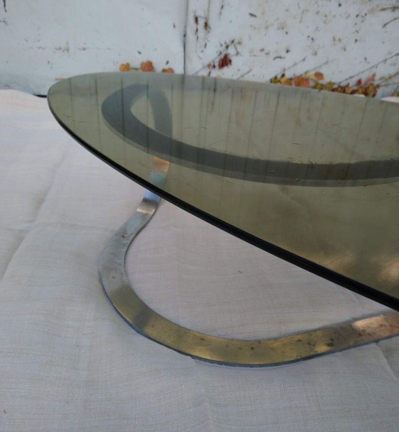 Coffee table oval smoked glass of the 1970s