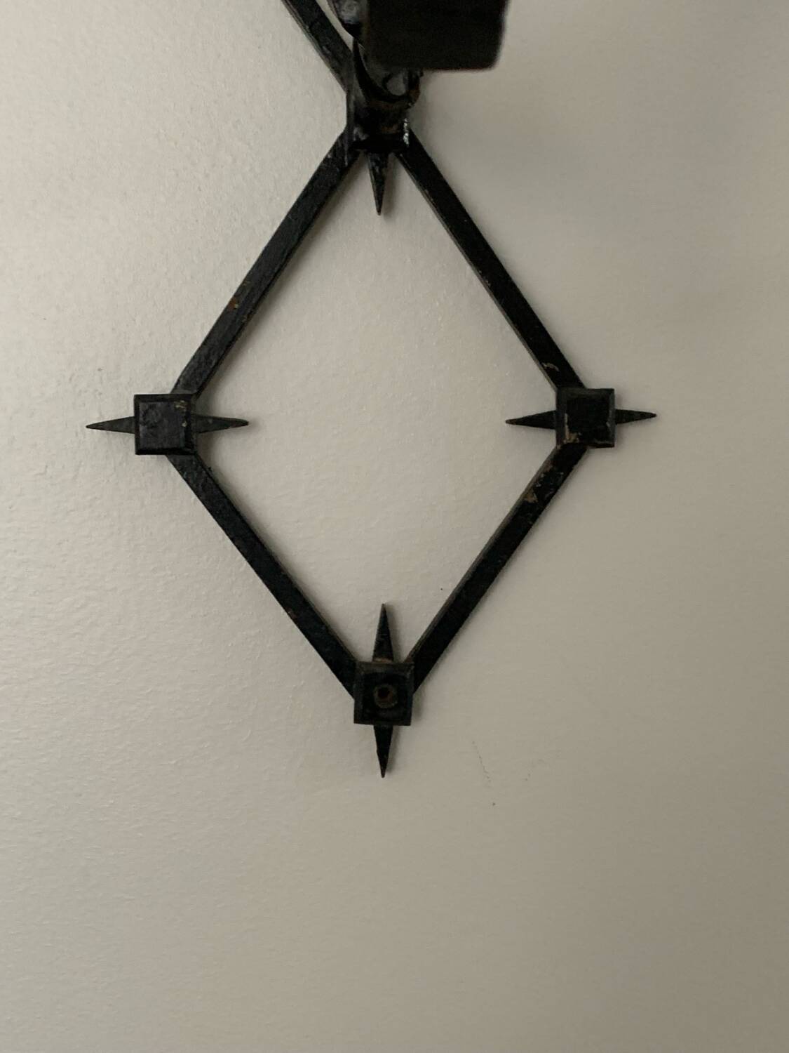 Wrought iron wall lights from the 60s