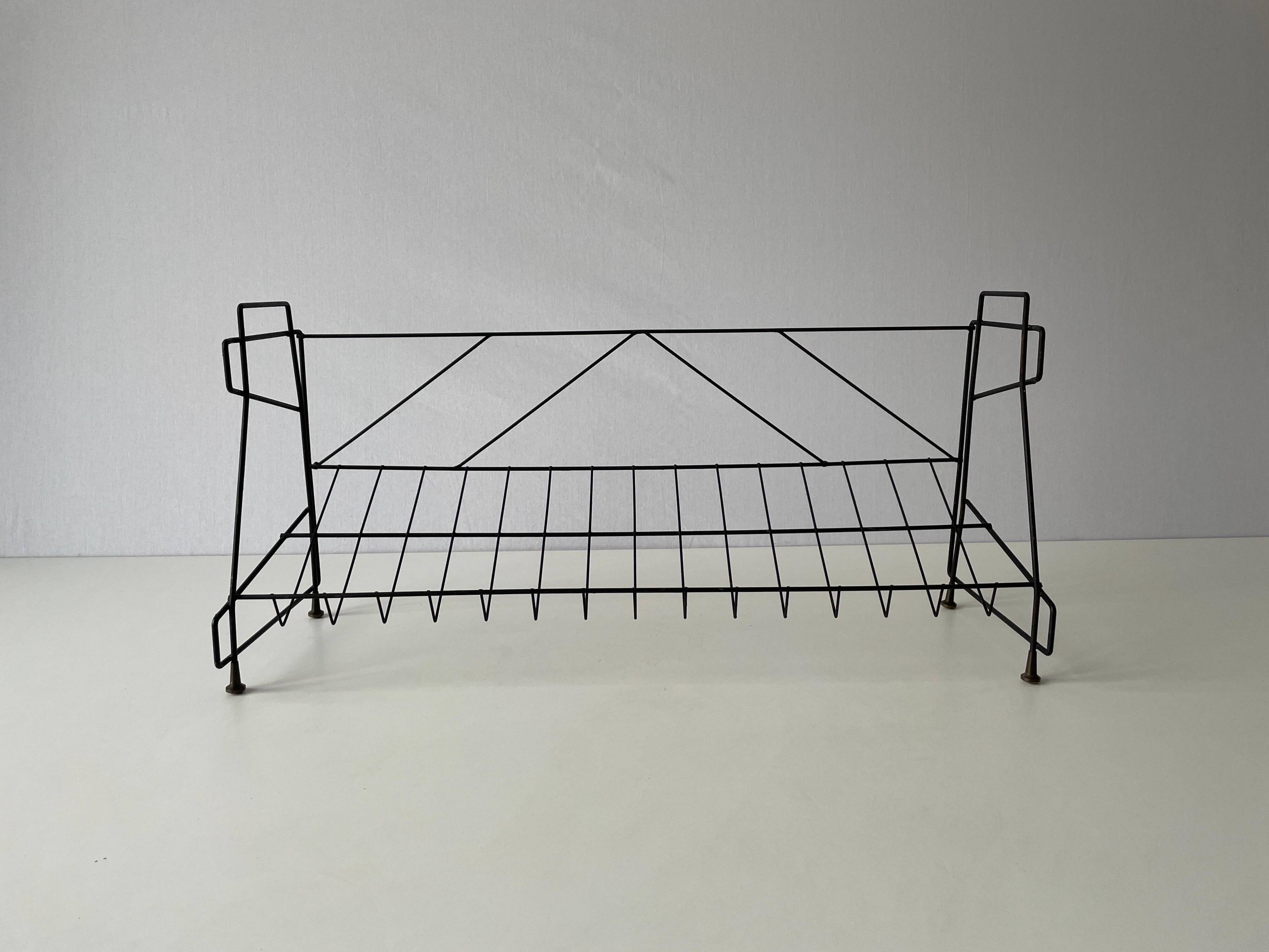 Free-standing shelf with a metal structure and 3 shelves, 1960s, Italy.