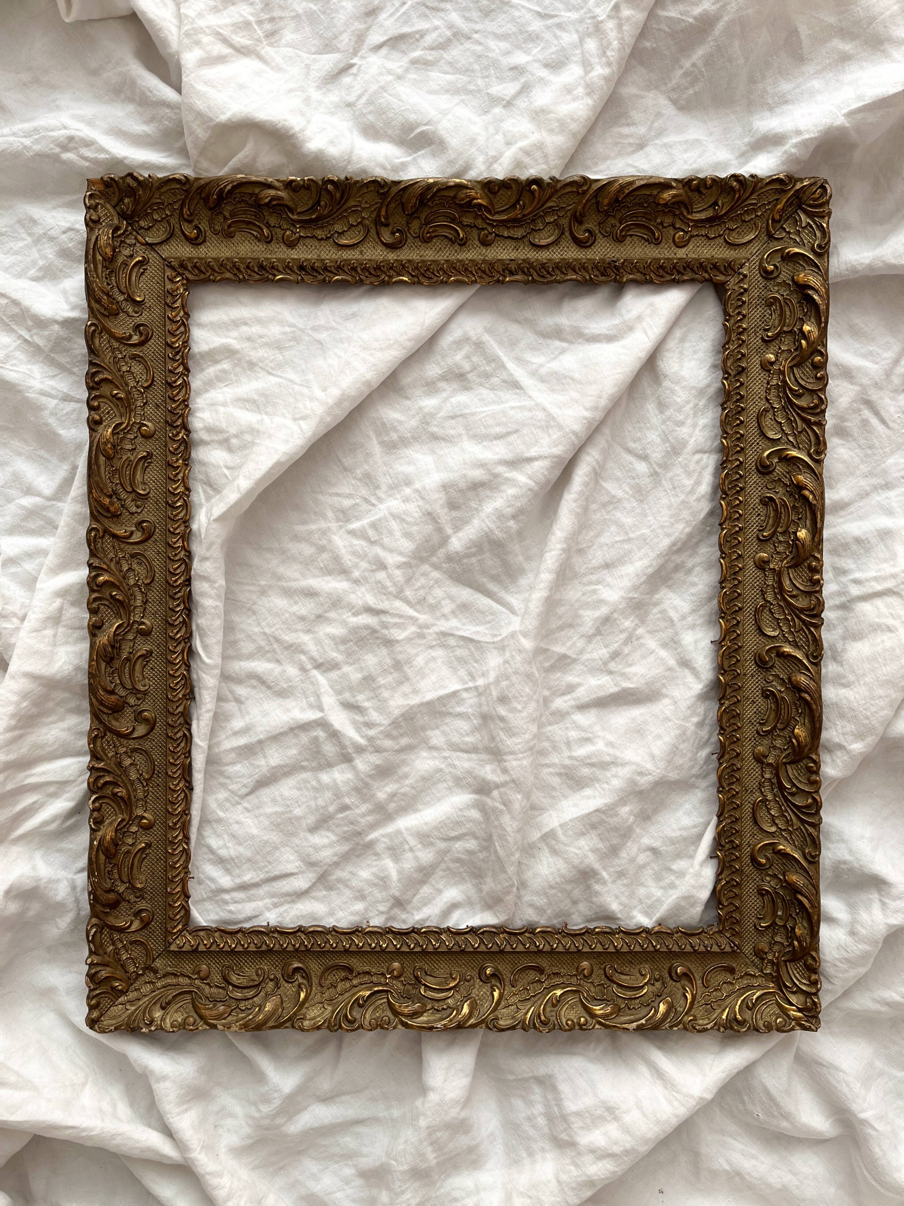 Old frame in gilded wood with stucco decoration circa 1900