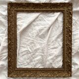 Old frame in gilded wood with stucco decoration circa 1900