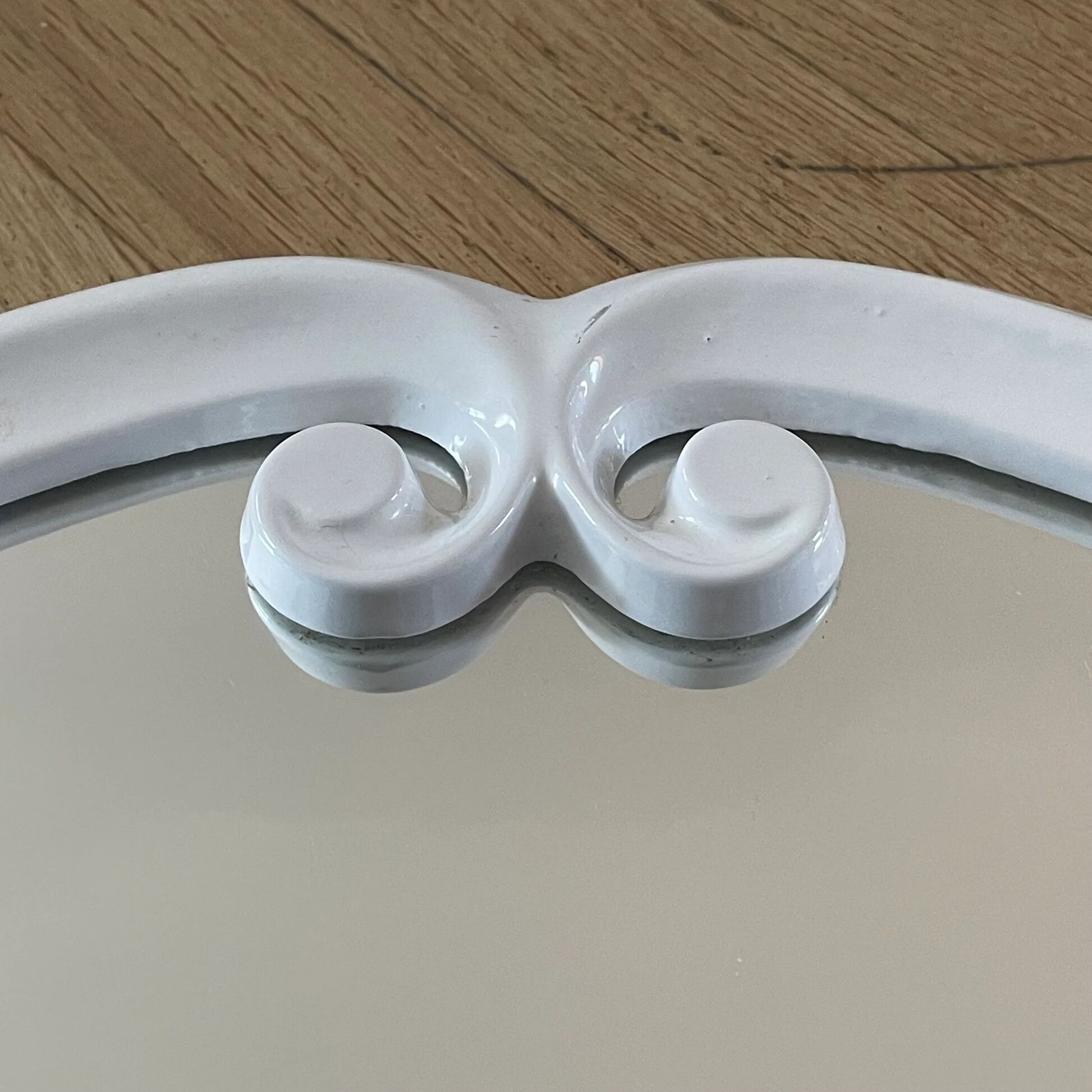 White enamelled cast iron mirror